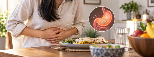 a women holding her stomach due to bloating